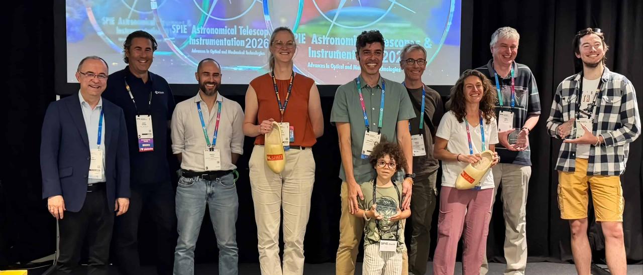 Elvio Hernández Suárez poses with other award recipients at SPIE Astronomical Telescopes + Instrumentation 2026.