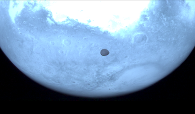 Image of Deimos with Mars on the background, obtained with the HyperScout-H instrument on board the Hera spacecraft 