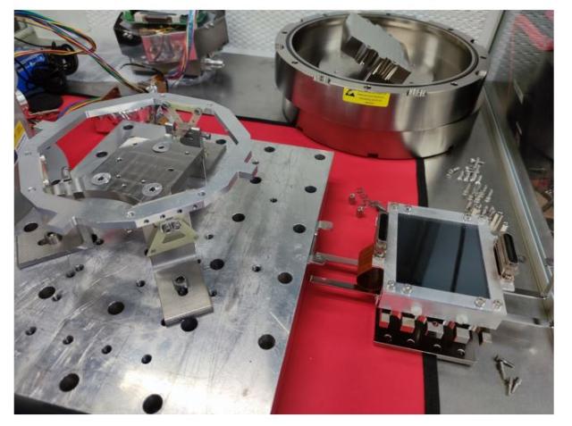 11 Handling large format CCDs. Mechanical integration process