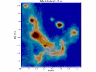 La escala de colores en la imagen muestra la cantidad de radiación infrarroja (calor) que proviene de partículas de polvo tibio en los filamentos y estrellas luminosas dentro de un año luz del centro galáctico. Las observaciones se realizaron con el teles 11907