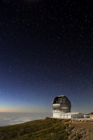 El Gran Telescopio CANARIAS (GTC) observando el cielo estrellado de La Palma, en el Observatorio del Roque de Los Muchachos.Autor: Pablo Bonet. 8103