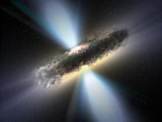 Visión de artista de la acreción por un agujero negro supermasivo de un espeso anillo de polvo. Durante la misma se producen chorros de rayos gamma y rayos X. Créditos: ESA / V. Beckmann (NASA-GSFC) 8109
